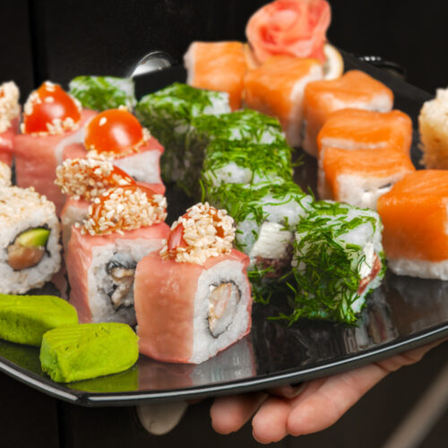 Denver's Slice of Japan - authentic assorted sushi served on a black plate